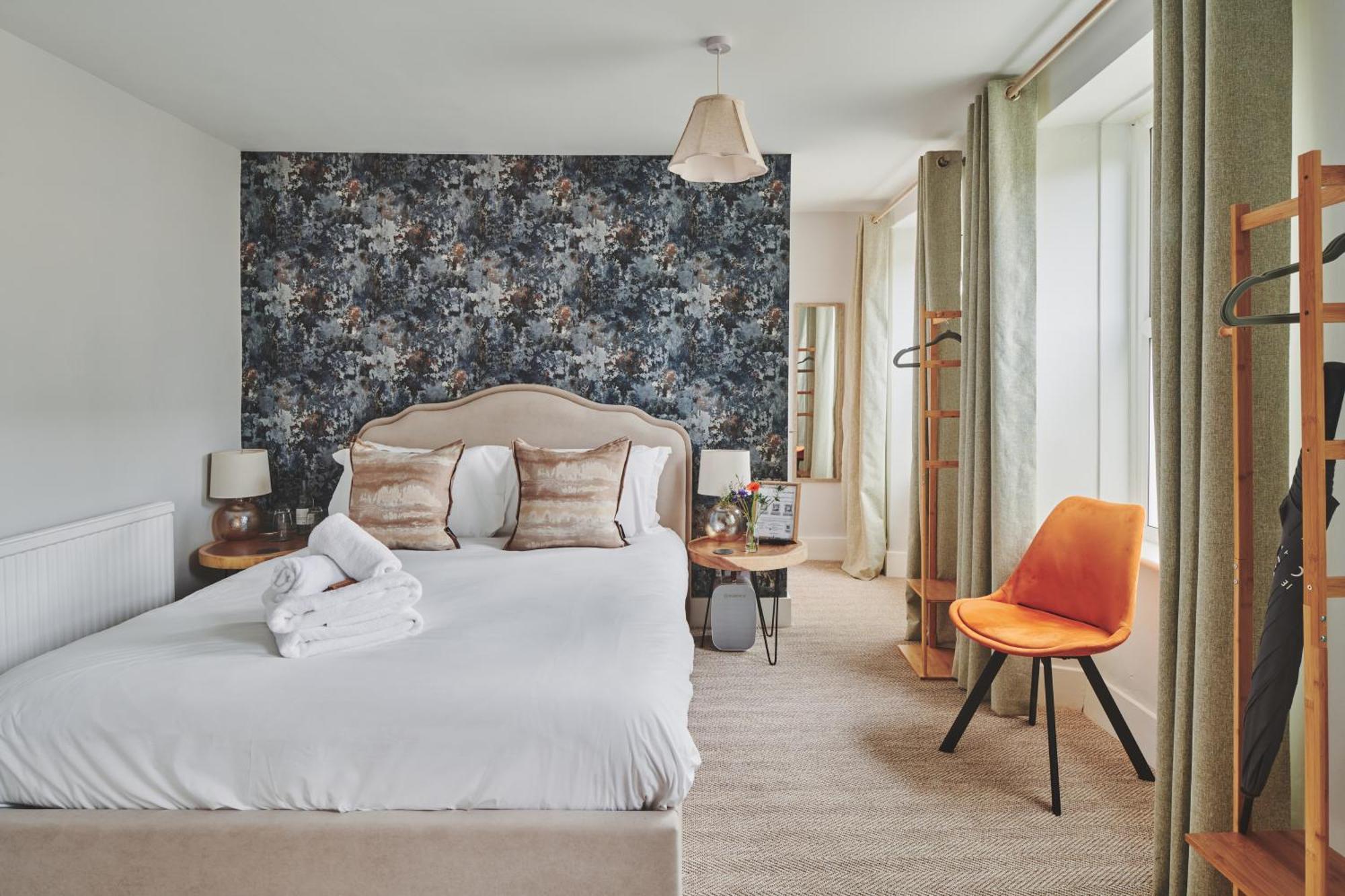 The Lansdowne Guest House Bourton-on-the-Water Extérieur photo A bedroom at The Swan